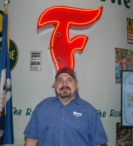 Image of employee Lamar Stelly in lobby of Ross Tire & Service in Lafayette, LA