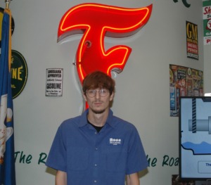 Image of employee Josh Landry in lobby of Ross Tire & Service in Lafayette, LA